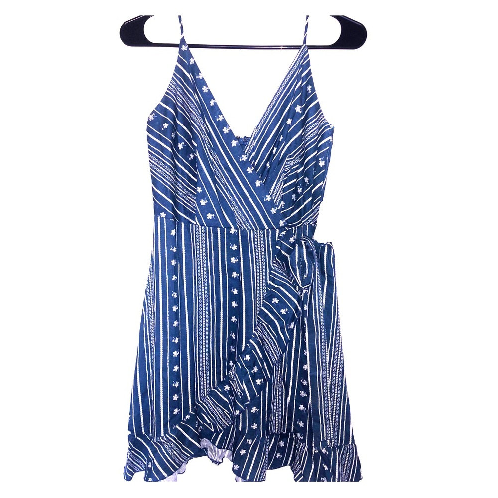 Flirty blue ruffle hem mini wrap dress